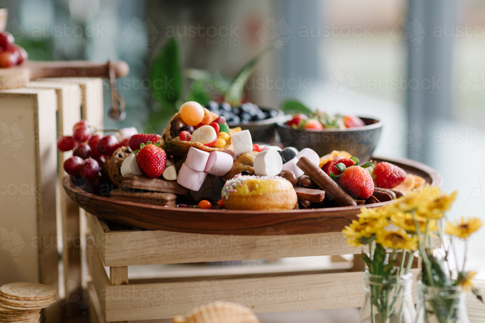 Sweet food platter on wooden crate - Australian Stock Image