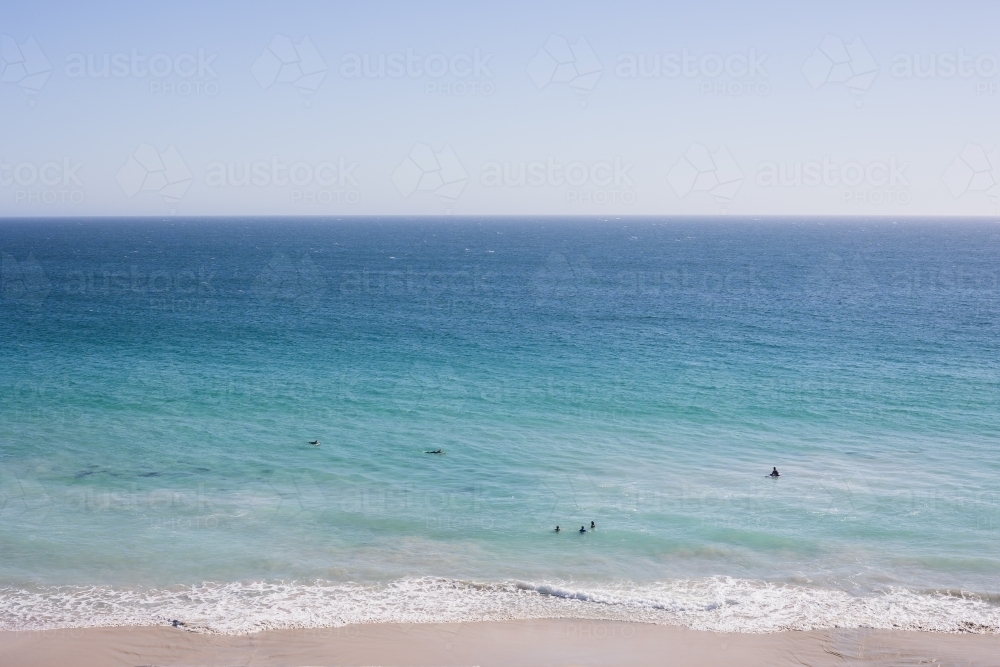 swimmers at remote beach - Australian Stock Image