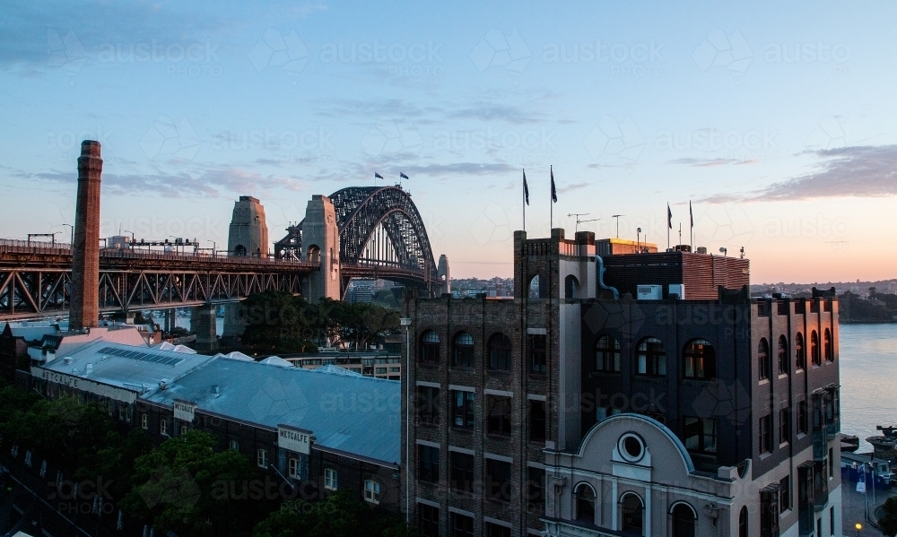 Sydney Harbour Bridge at sunrise from The Rocks - Australian Stock Image