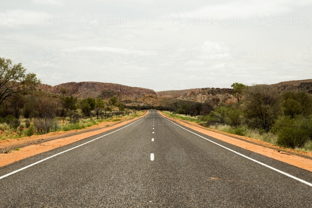 Symmetrical view of rural road - Australian Stock Image