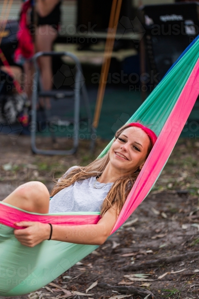 Image Of Teen Girl Relaxing Back In Hammock In Bushland Campground In Summer Austockphoto