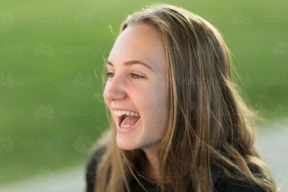Teenage girl laughing - Australian Stock Image