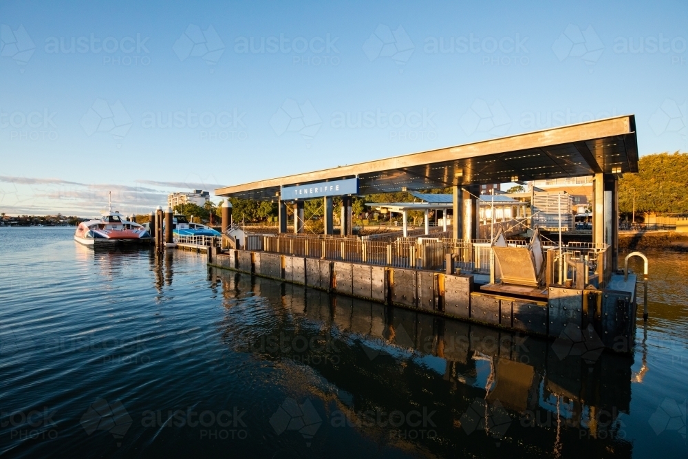 Teneriffe Citycat ferry terminal on the Brisbane River in the morning - Australian Stock Image