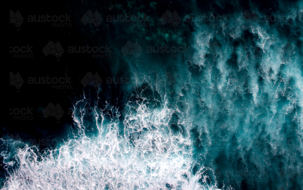 Texture of waves breaking in the ocean - Australian Stock Image