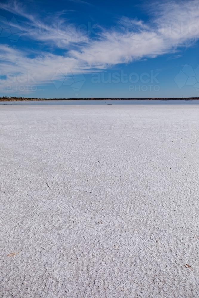 textured surface of dry salt lake - Australian Stock Image