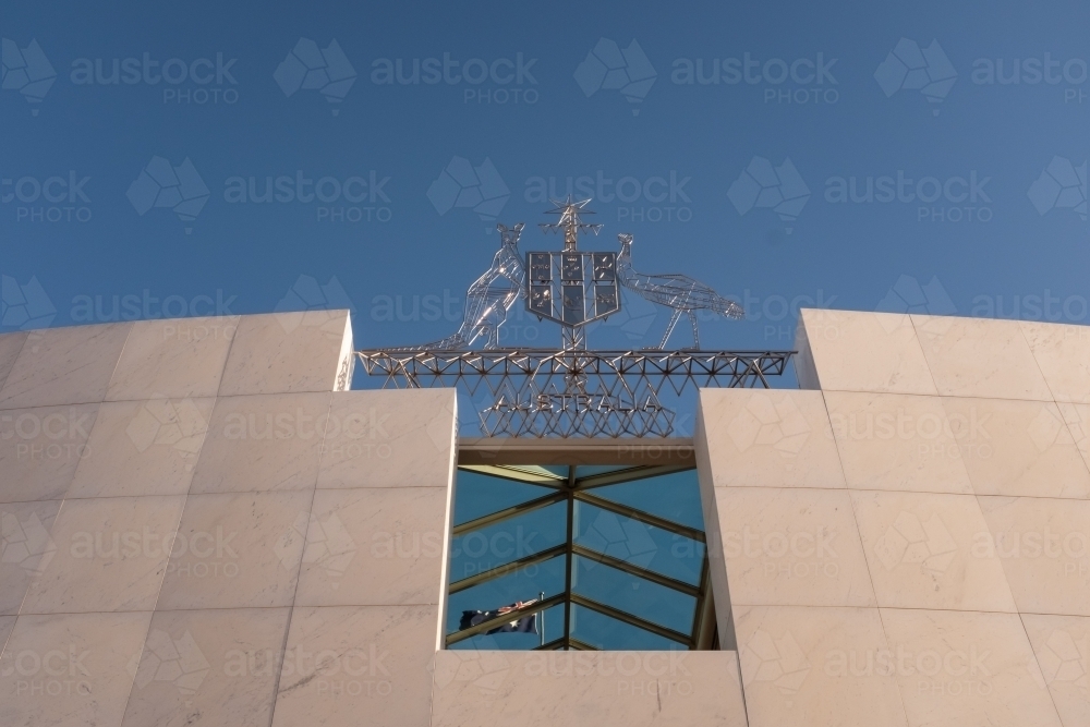 The australian coat of arms at the new government house in canberra ausralia - Australian Stock Image