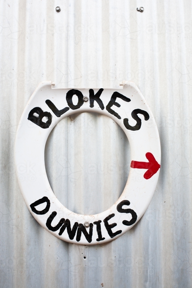 The blokes dunnies. Toilet lids for toilet signs. Daly Waters, Northern Territory - Australian Stock Image