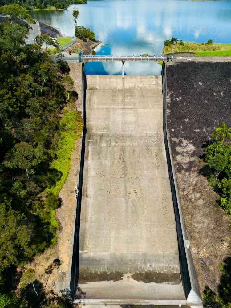 The concrete spillway of Baroon Pocket Dam in the Sunshine Coast hinterland. - Australian Stock Image