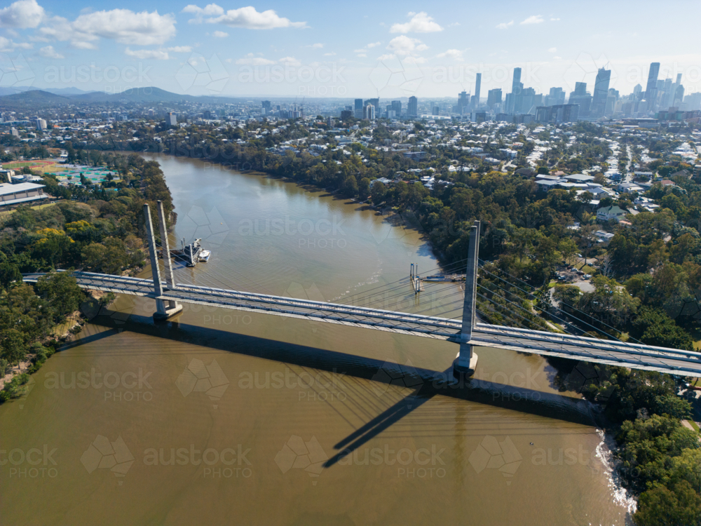 The Eleanor Schonell Bridge crossing the Brisbane River, Brisbane city in background - Australian Stock Image