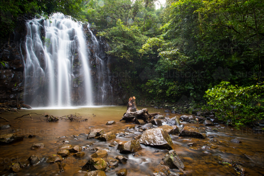 The famous Ellinjaa Falls waterfall in the Atherton Tablelands area of Queensland, Australia - Australian Stock Image