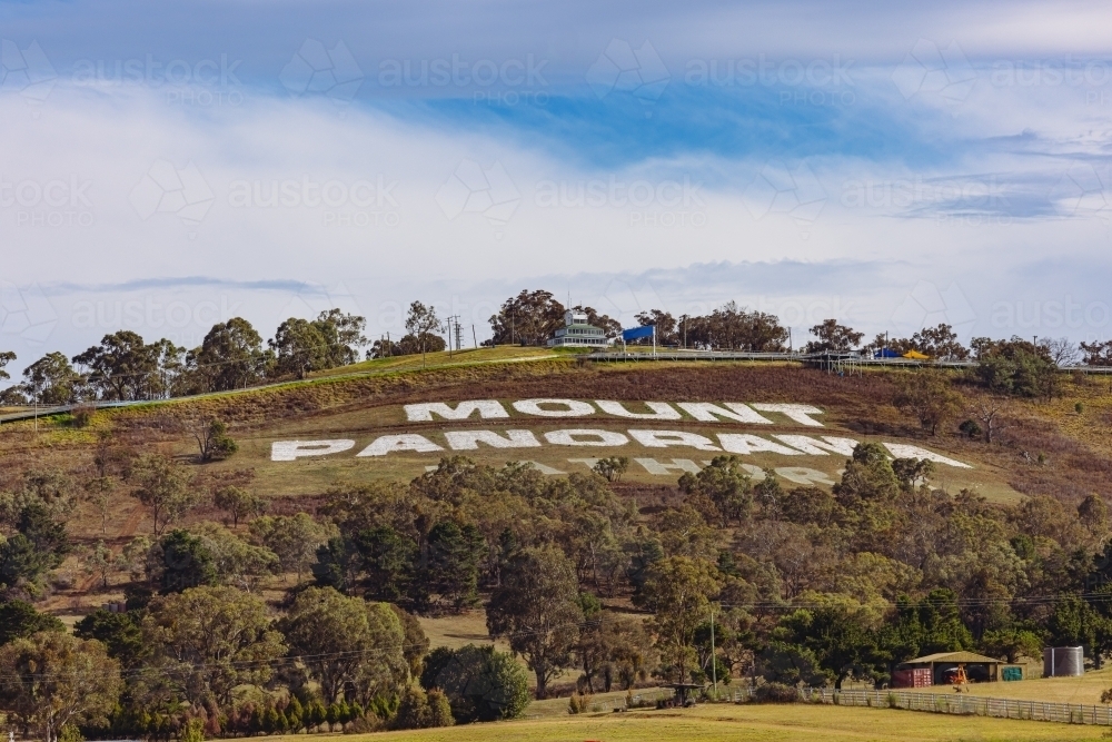 The Mount Panorama racing circuit sign at Bathurst NSW seen from distance - Australian Stock Image