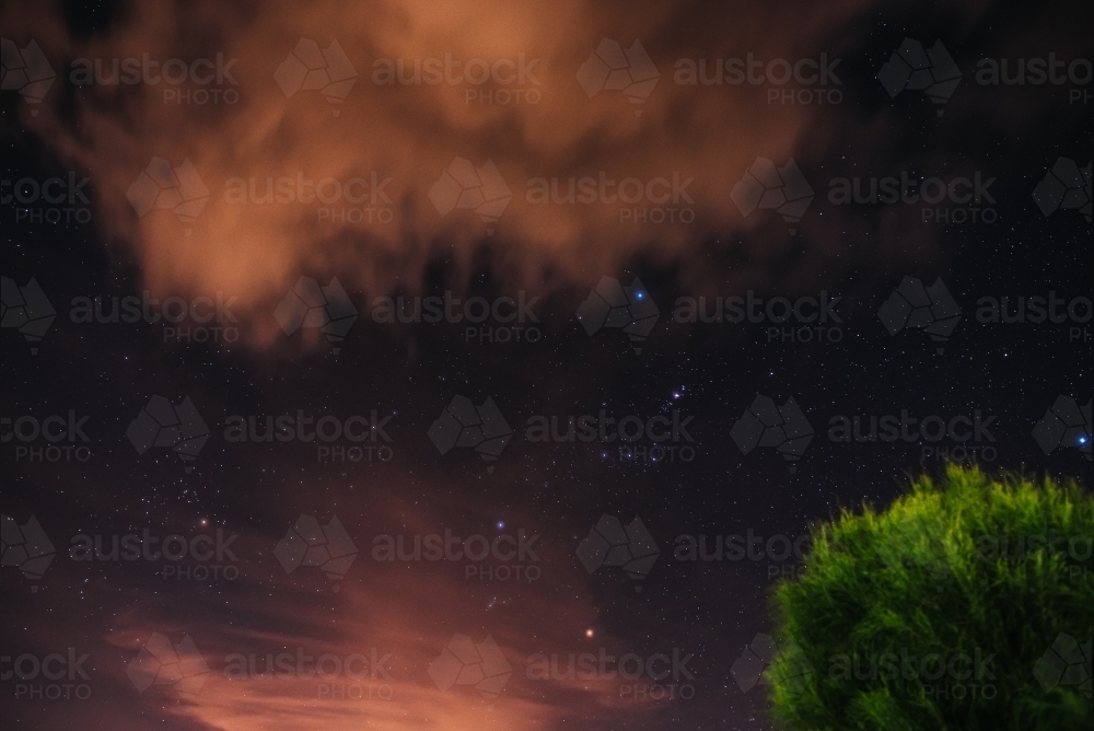 The sky at night with peach clouds - Australian Stock Image