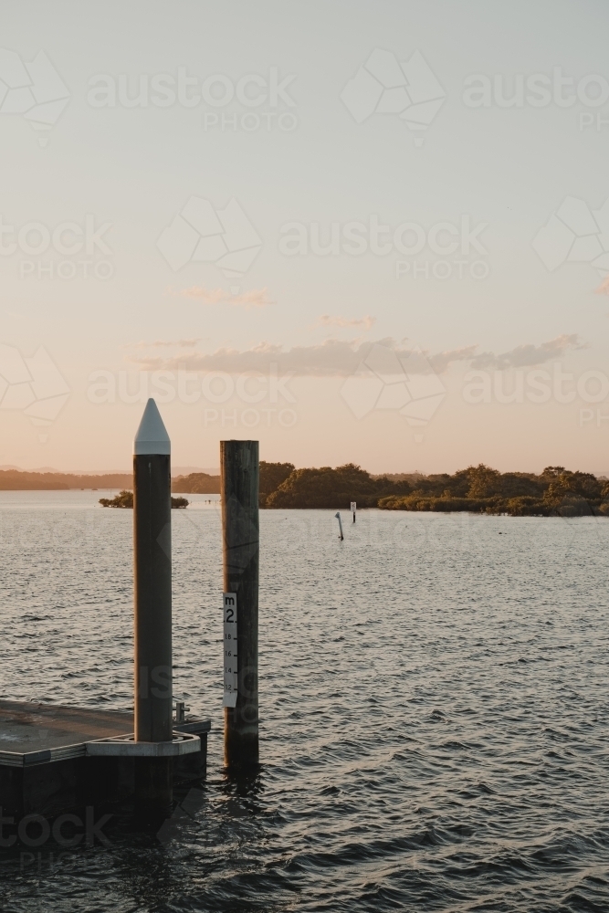 The Yamba Wharf at sunset near the Yamba Marina on the Clarence River. - Australian Stock Image