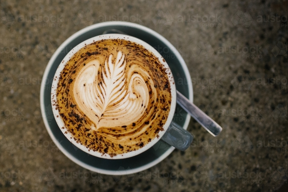 Top view of a coffee served in a cup - Australian Stock Image