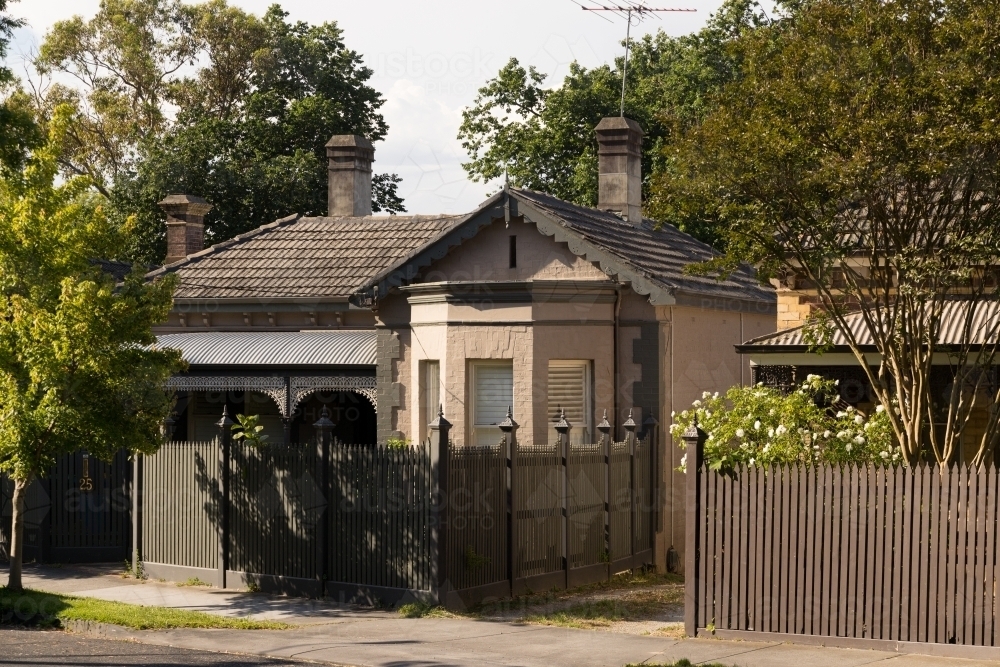 Traditional character brick constructed home on a suburban street of Melbourne - Australian Stock Image