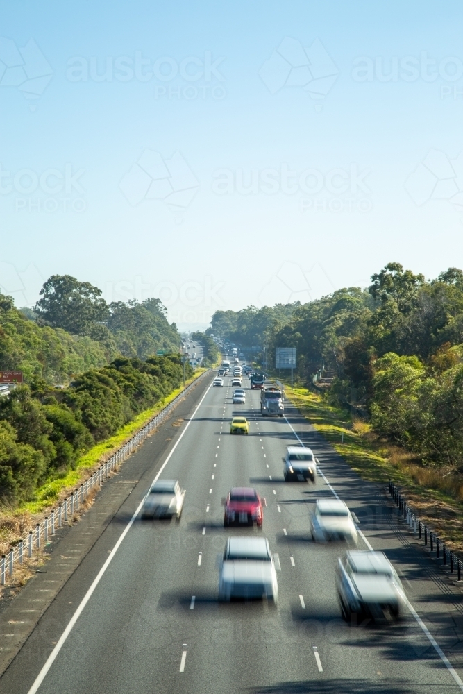 Traffic moving on M1 highway, north of Brisbane - Australian Stock Image