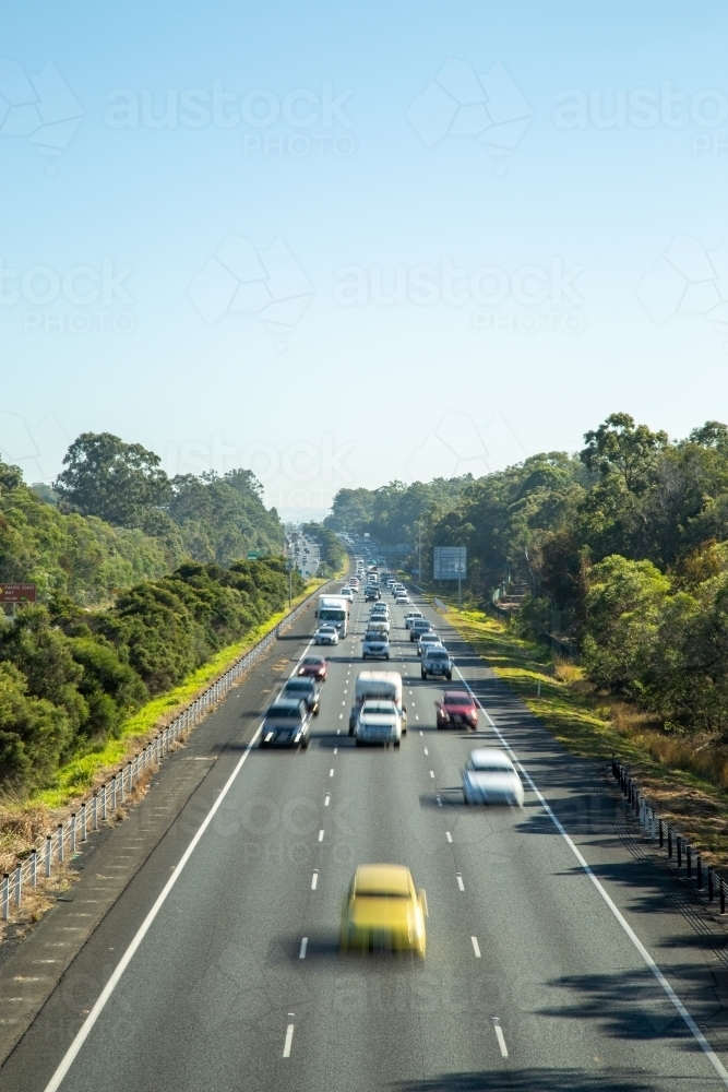 Traffic moving on M1 highway, north of Brisbane - Australian Stock Image