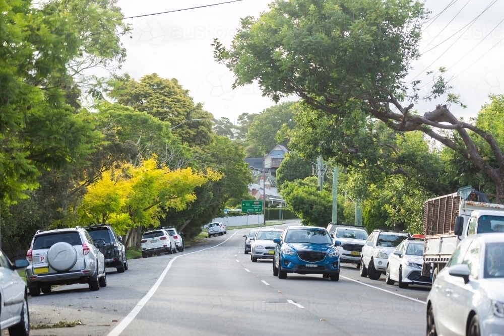 Traffic on narrow city road in Newcastle - Australian Stock Image