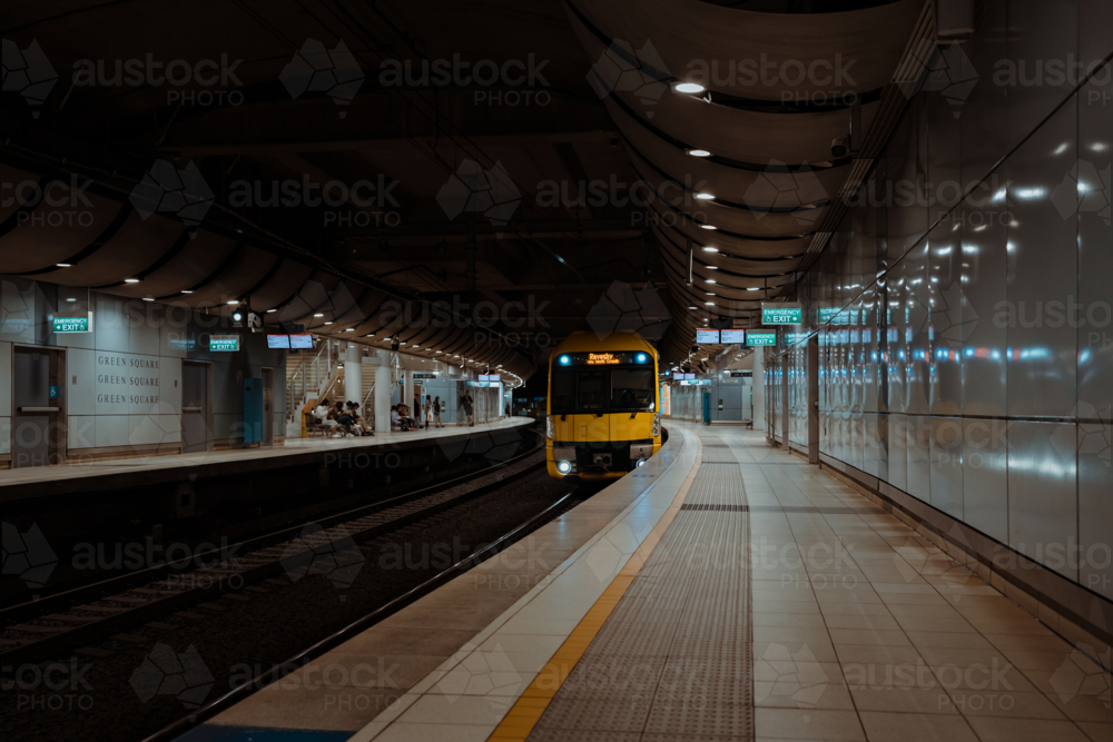 Train approaching the platform at Green Square Station - Australian Stock Image