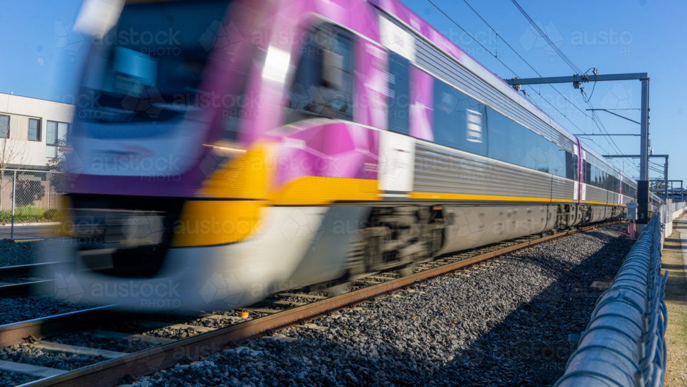 Train moving along tracks in Melbourne - Australian Stock Image