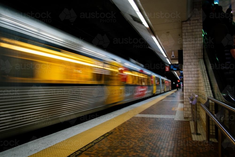 Image Of Train Passing Through City Station At Night Austockphoto