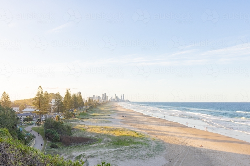 Tranquil beach afternoon with view of the Gold Coast city skyline - Australian Stock Image