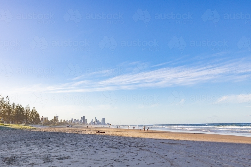 Tranquil beach afternoon with view of the Gold Coast city skyline - Australian Stock Image