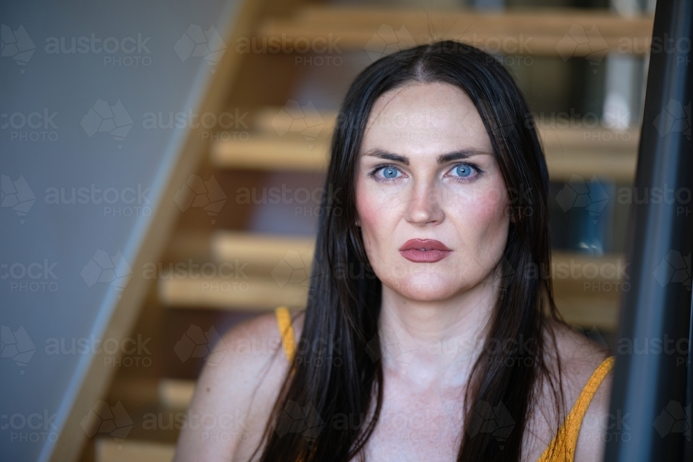 Transgender woman on stairway - Australian Stock Image