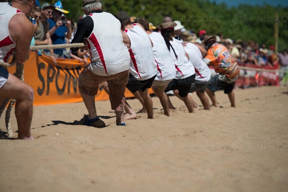 Tug of War on the beach - Australian Stock Image