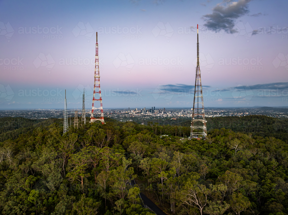 TV towers on hill with Brisbane City behind - Australian Stock Image