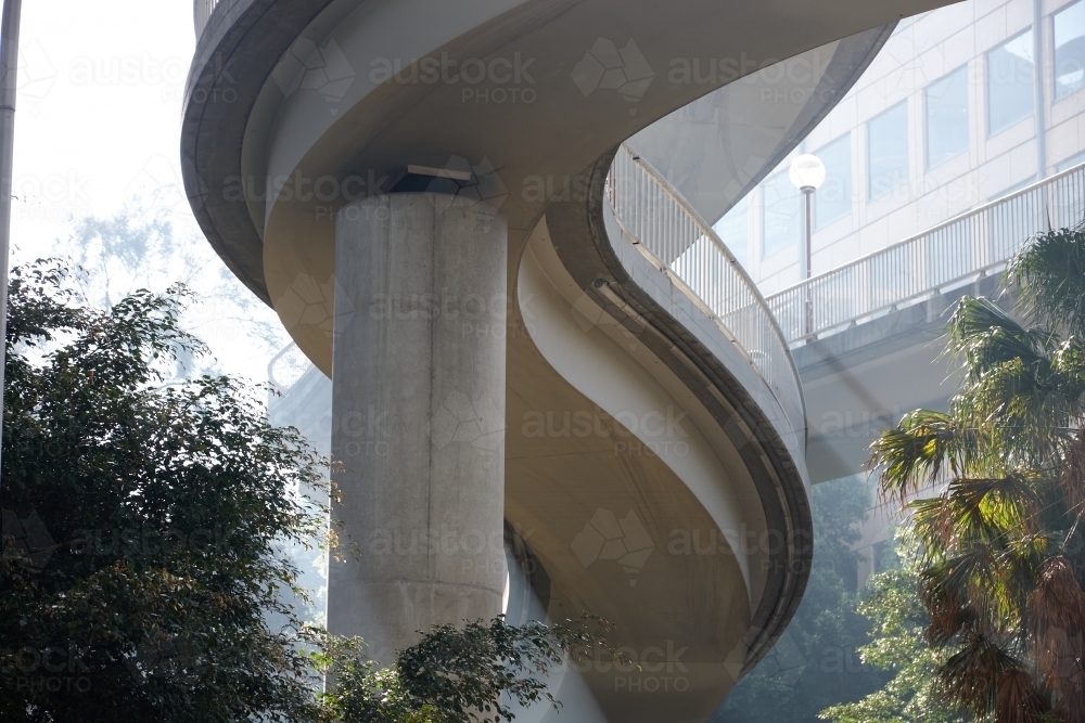 Twisted ramp over trees in Sydney city - Australian Stock Image