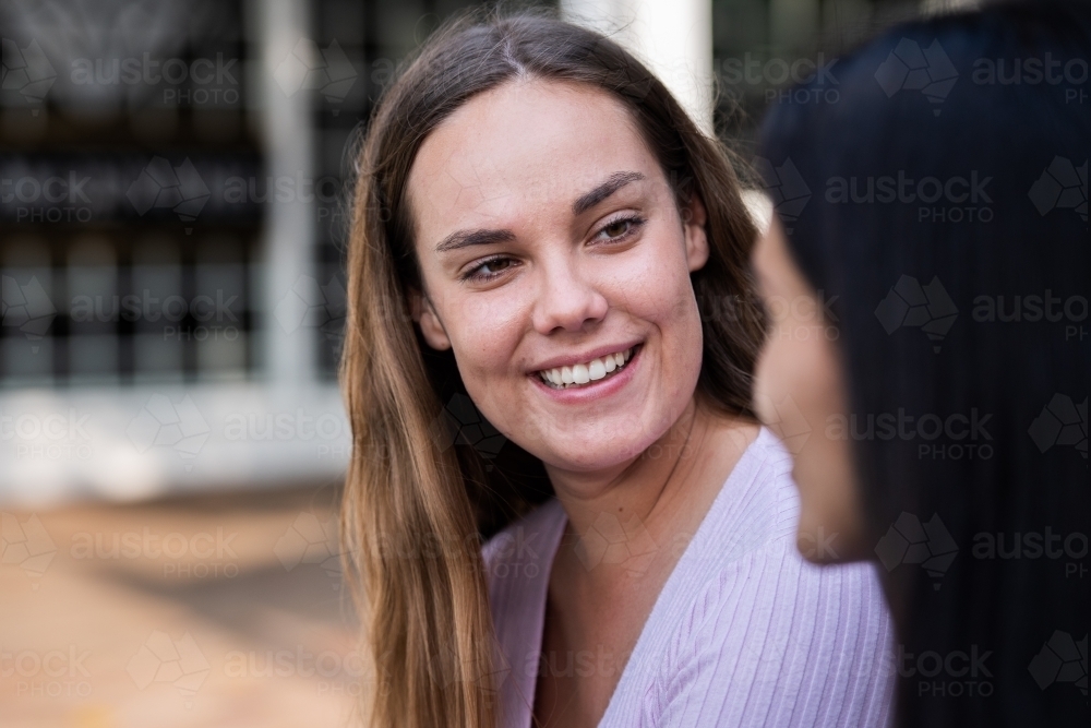 two friends chatting - Australian Stock Image