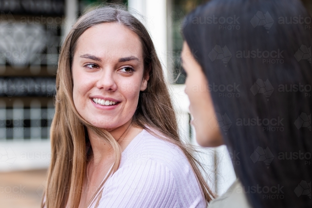 two friends chatting - Australian Stock Image