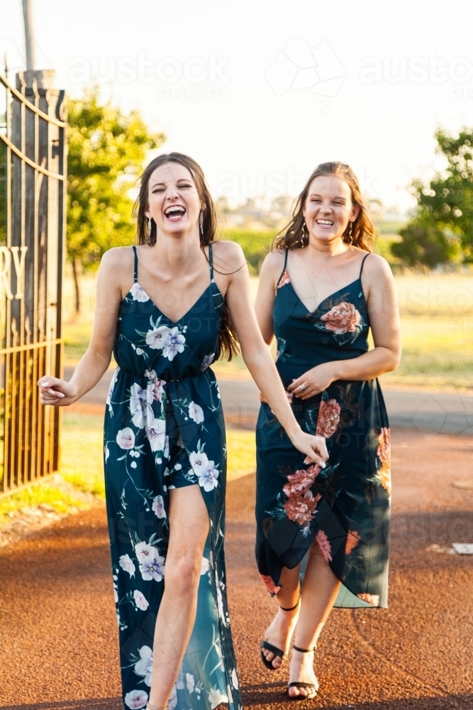 Two good friends laughing together - Australian Stock Image