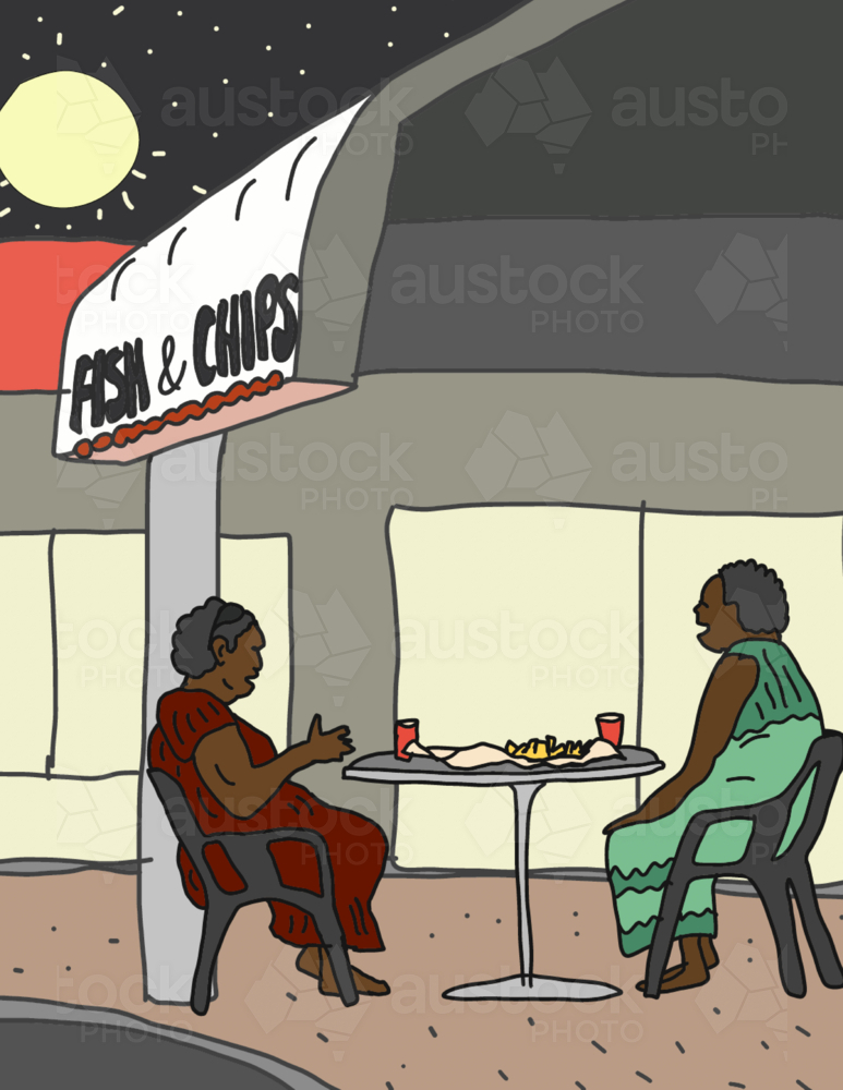 Two happy Aboriginal women talking while eating fish and chips outside shop - Australian Stock Image