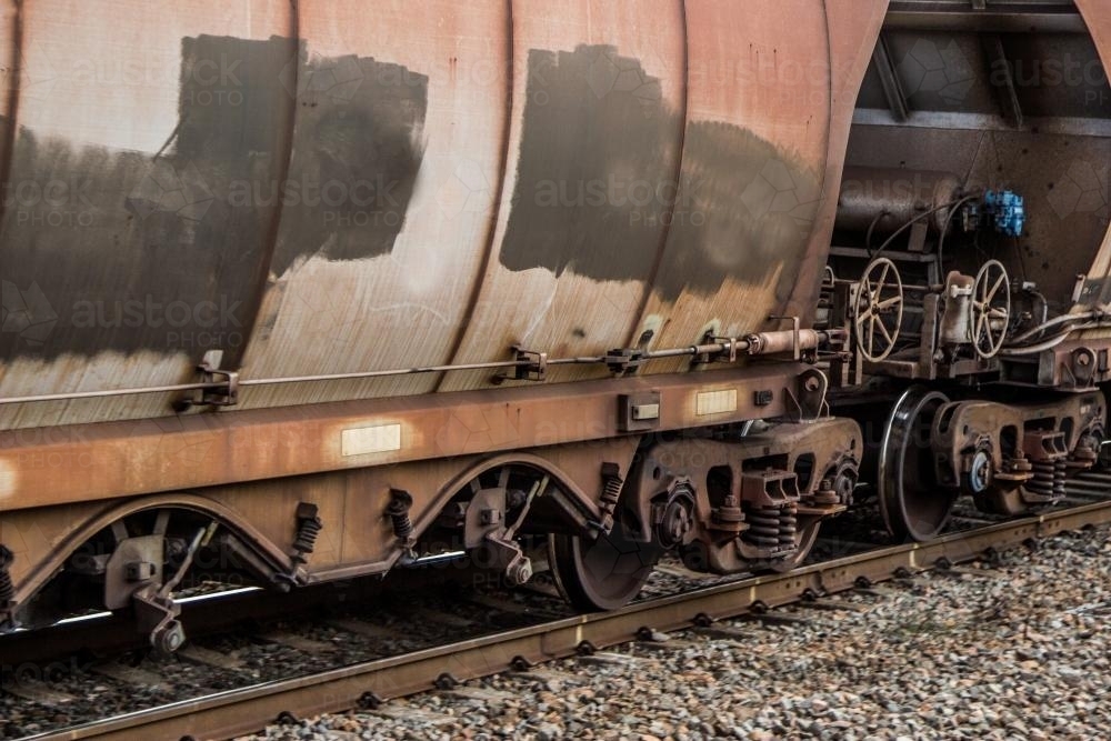 Two rusty old coal train carriages - Australian Stock Image