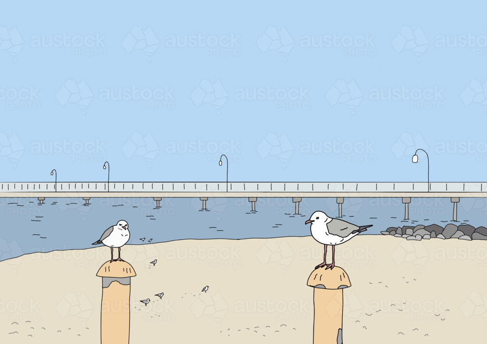 Two seagulls perched on posts at beach with blue sky, water and jetty in background - Australian Stock Image