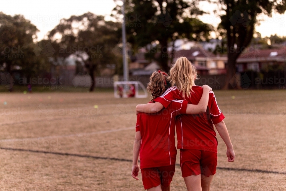 Two tween football players at practise - Australian Stock Image