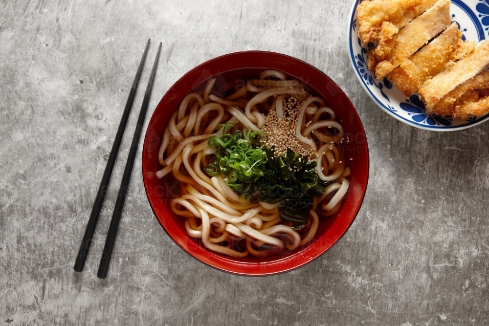 Image of Udon noodle soup and katsu chicken in bowl Austockphoto