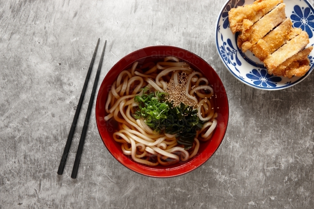 Udon noodle soup in bowl - Australian Stock Image