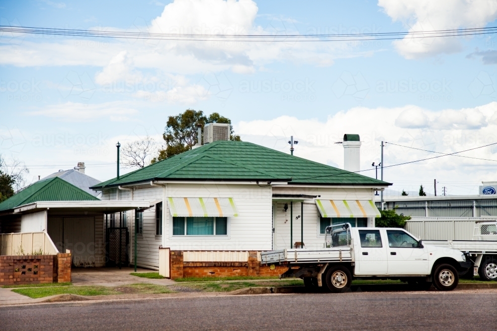 Ute parked outside home in country town - Australian Stock Image