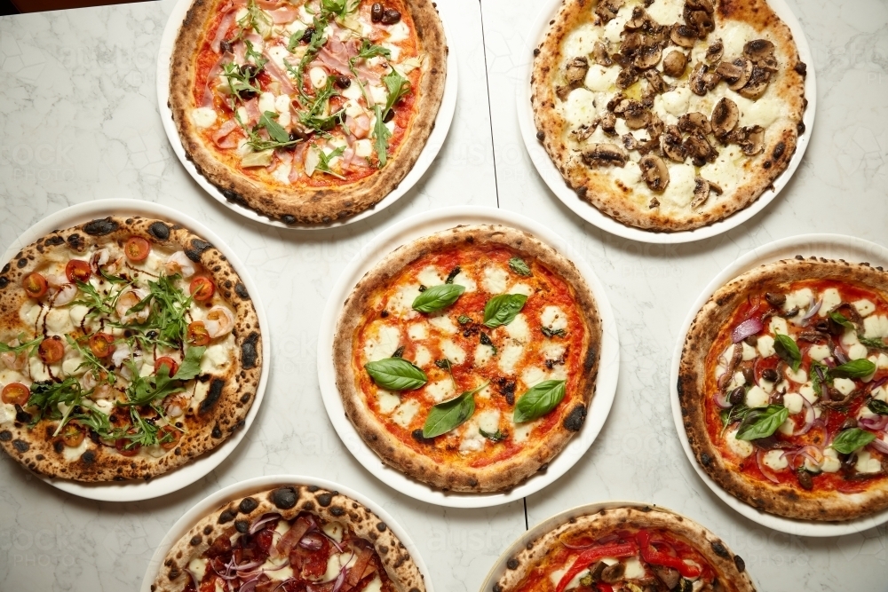 various kinds of california style pizza - Australian Stock Image