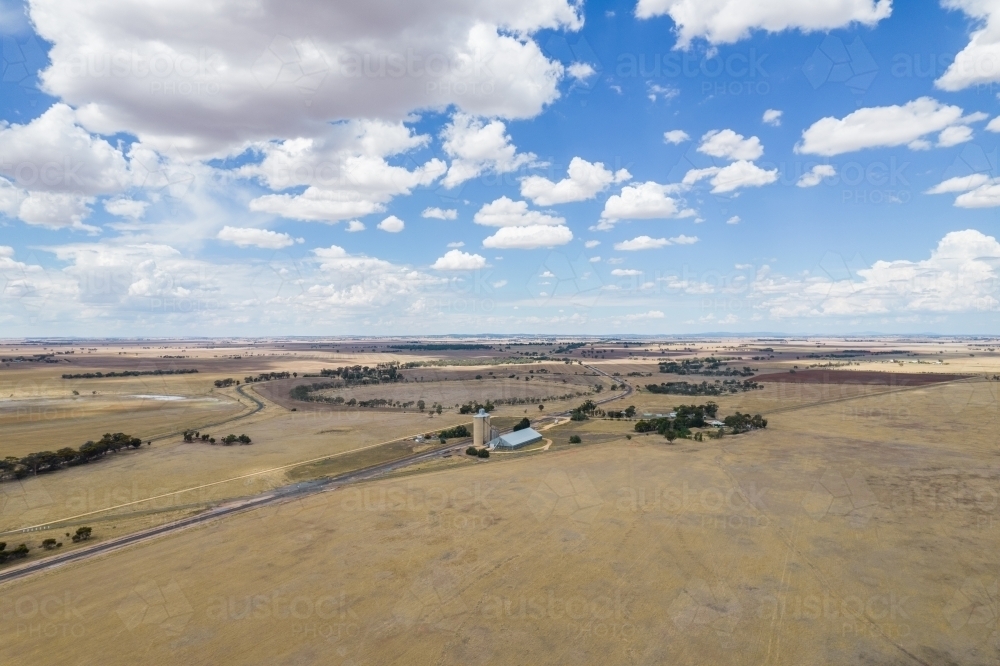 Image Of Vast Land Of Paddocks And Silos In The Distance Austockphoto