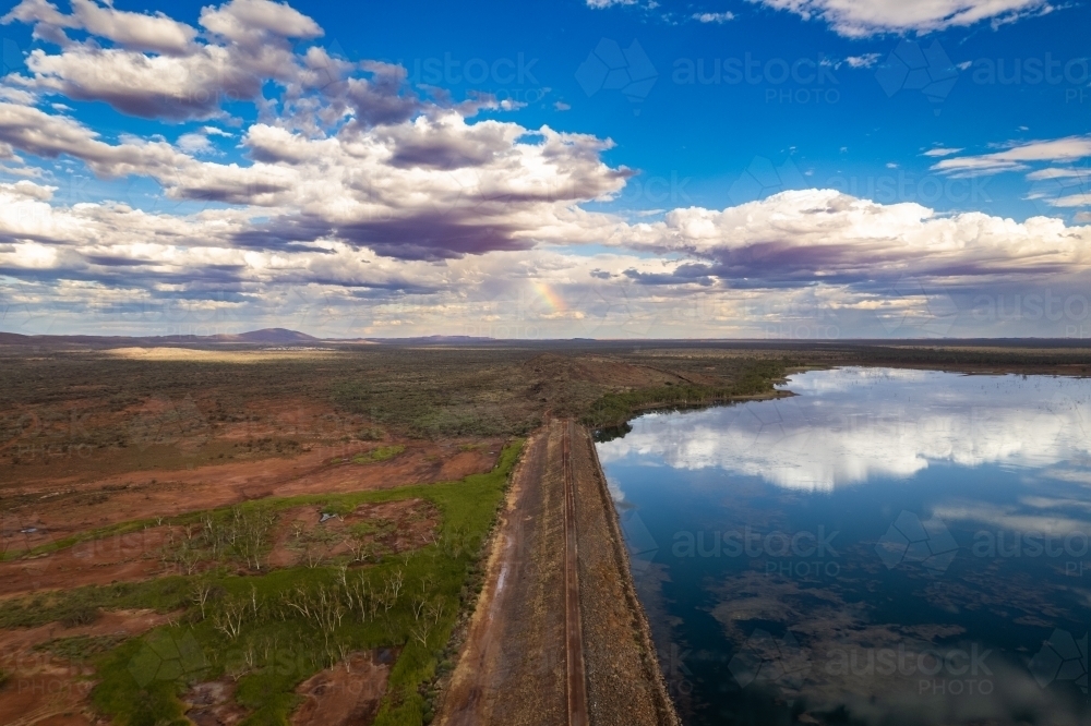 Vast rural landscape with reflective lake - Australian Stock Image