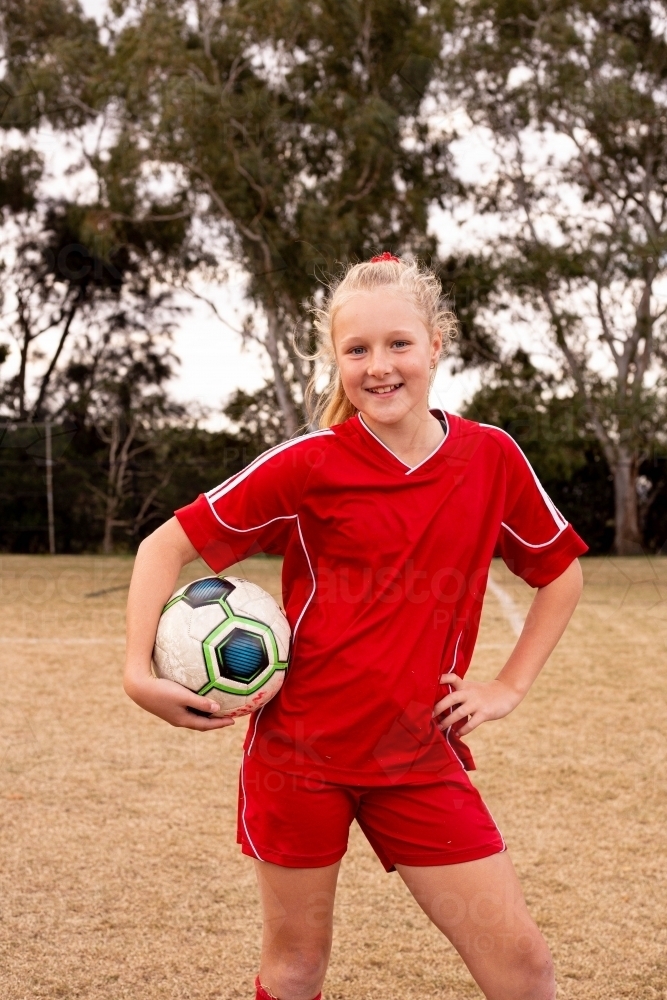 Vertical portrait of a girl soccer player - Australian Stock Image