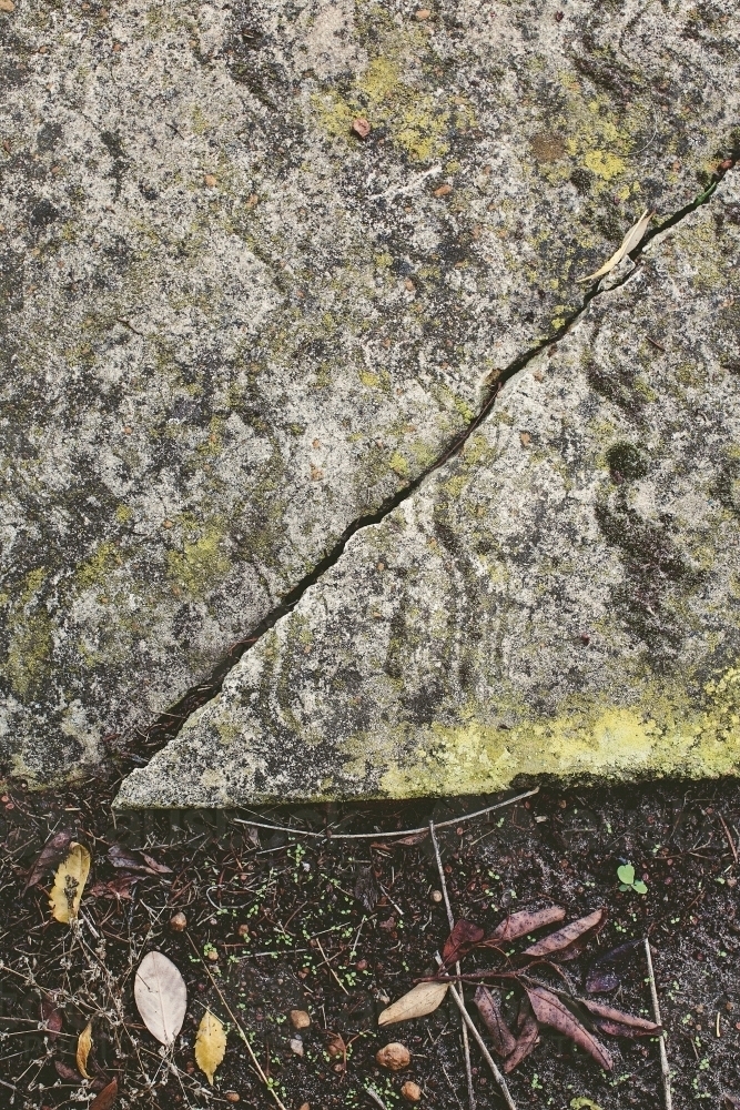 Vertical shot of cracked cement - Australian Stock Image