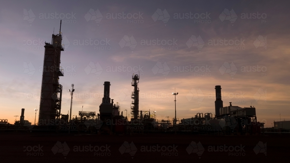 Vertical shot of tower plants with afternoon skies - Australian Stock Image