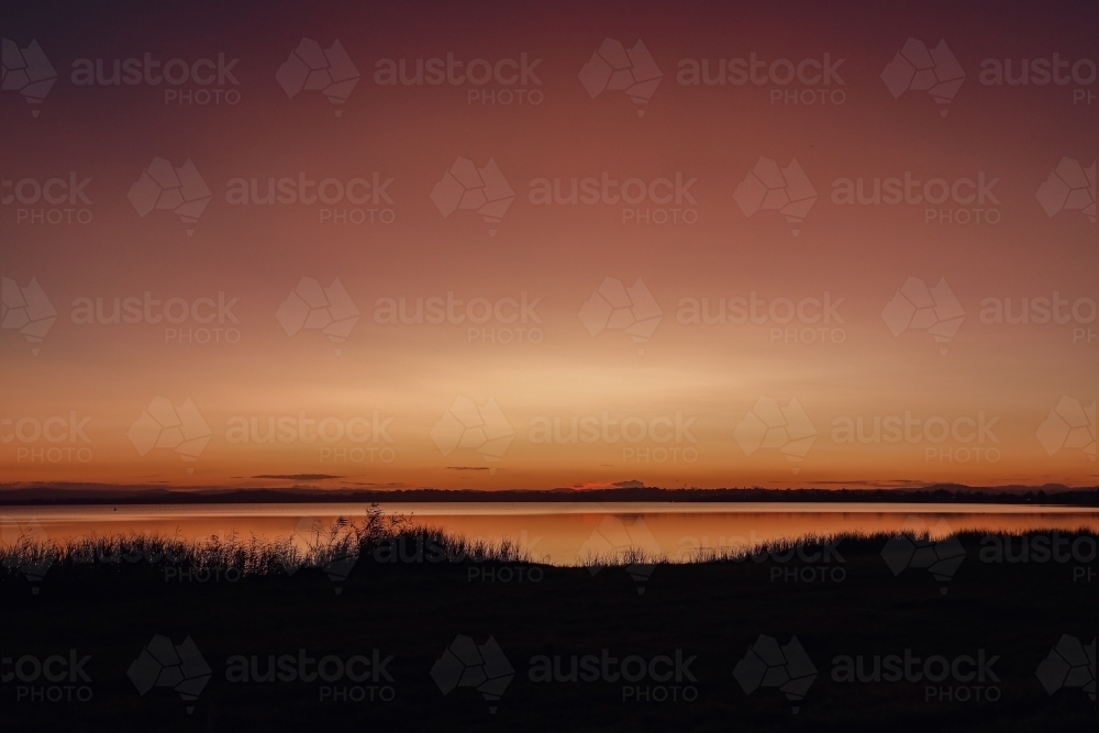 Image of Vibrant sunset sky over Tuggerah Lake from Canton Beach on the ...