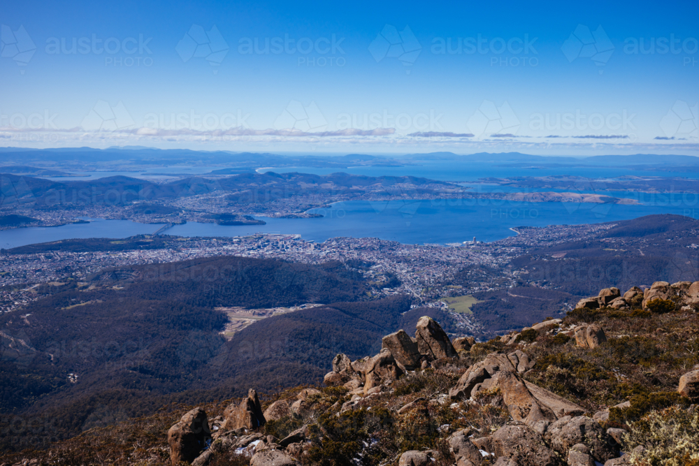 view from the summit of Mt Wellington on a cold spring morning looking over Hobart Tasmania - Australian Stock Image