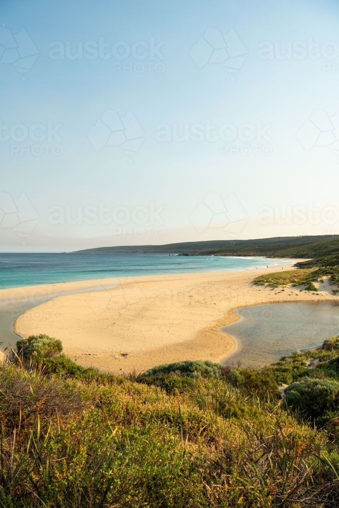 view of beach and ocean from top of sand dune - Australian Stock Image